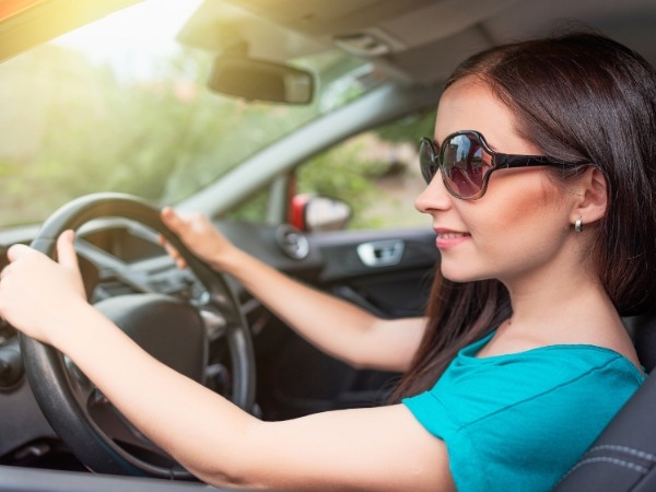Woman Driving a Car